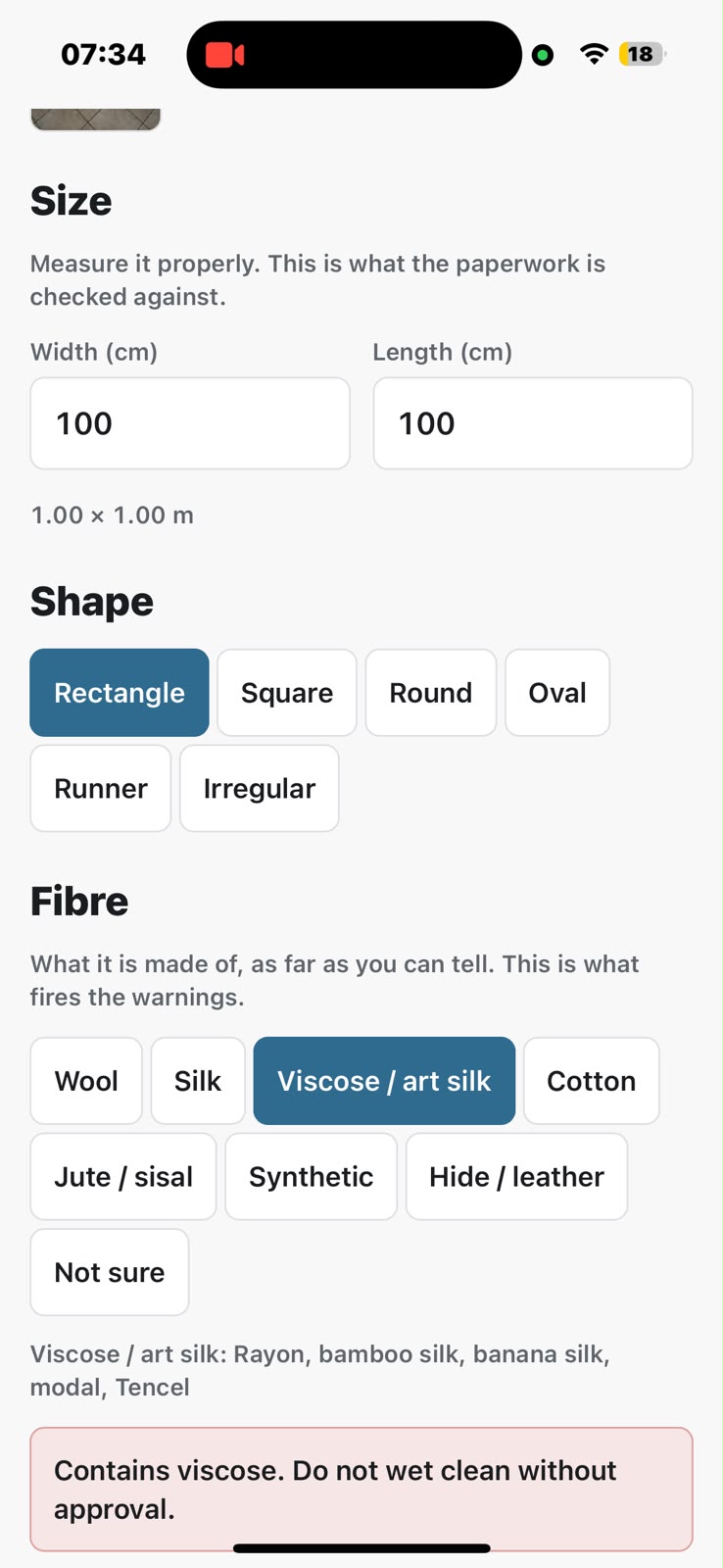 The details step being filled in: width and length in centimetres, Rectangle selected under Shape, and Viscose / art silk selected under Fibre, with a red panel warning 'Contains viscose. Do not wet clean without approval.'